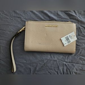Light pink michael kors wristlet